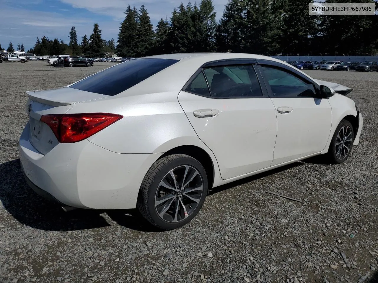 2017 Toyota Corolla L VIN: 5YFBURHE3HP667986 Lot: 72980404