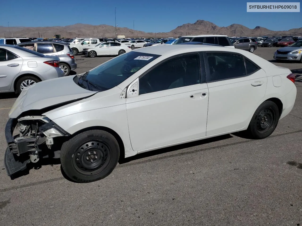 2017 Toyota Corolla L VIN: 5YFBURHE1HP609018 Lot: 74719734