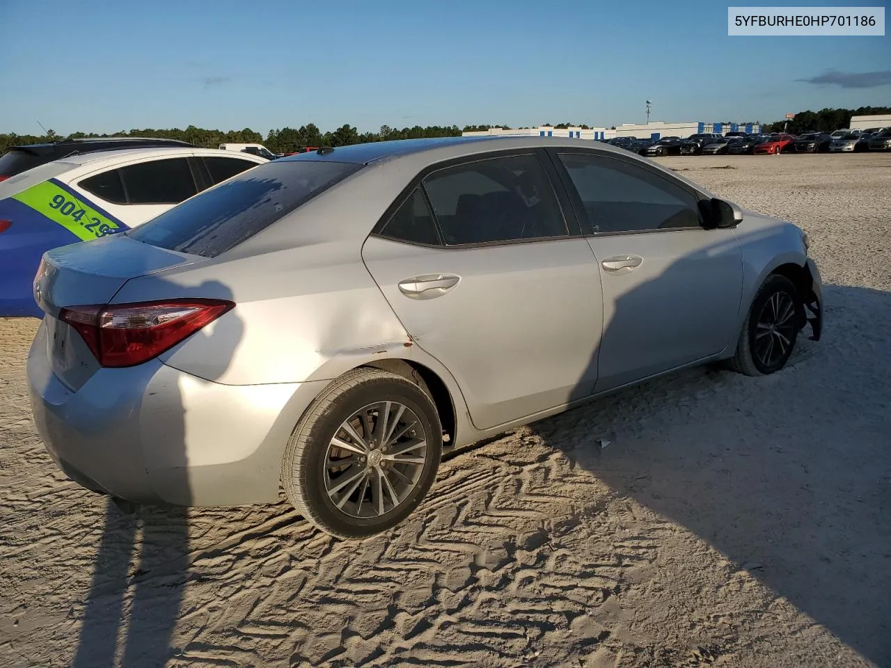 2017 Toyota Corolla L VIN: 5YFBURHE0HP701186 Lot: 75619074