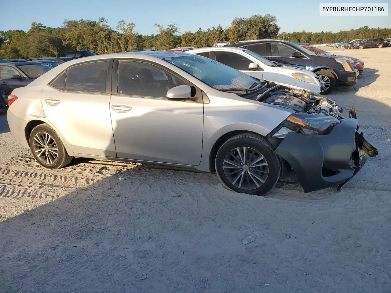 2017 Toyota Corolla L VIN: 5YFBURHE0HP701186 Lot: 75619074