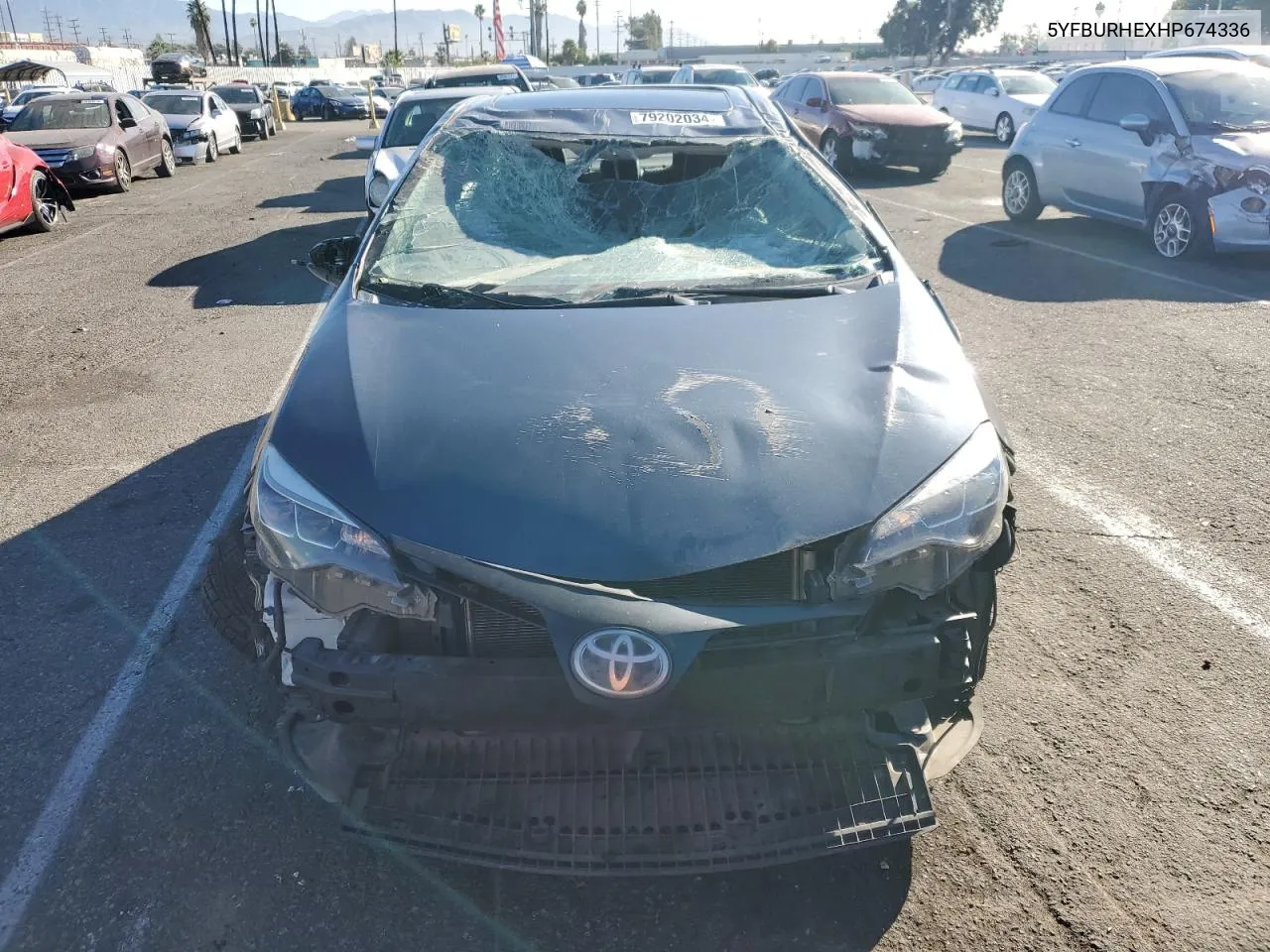 2017 Toyota Corolla L VIN: 5YFBURHEXHP674336 Lot: 79202034