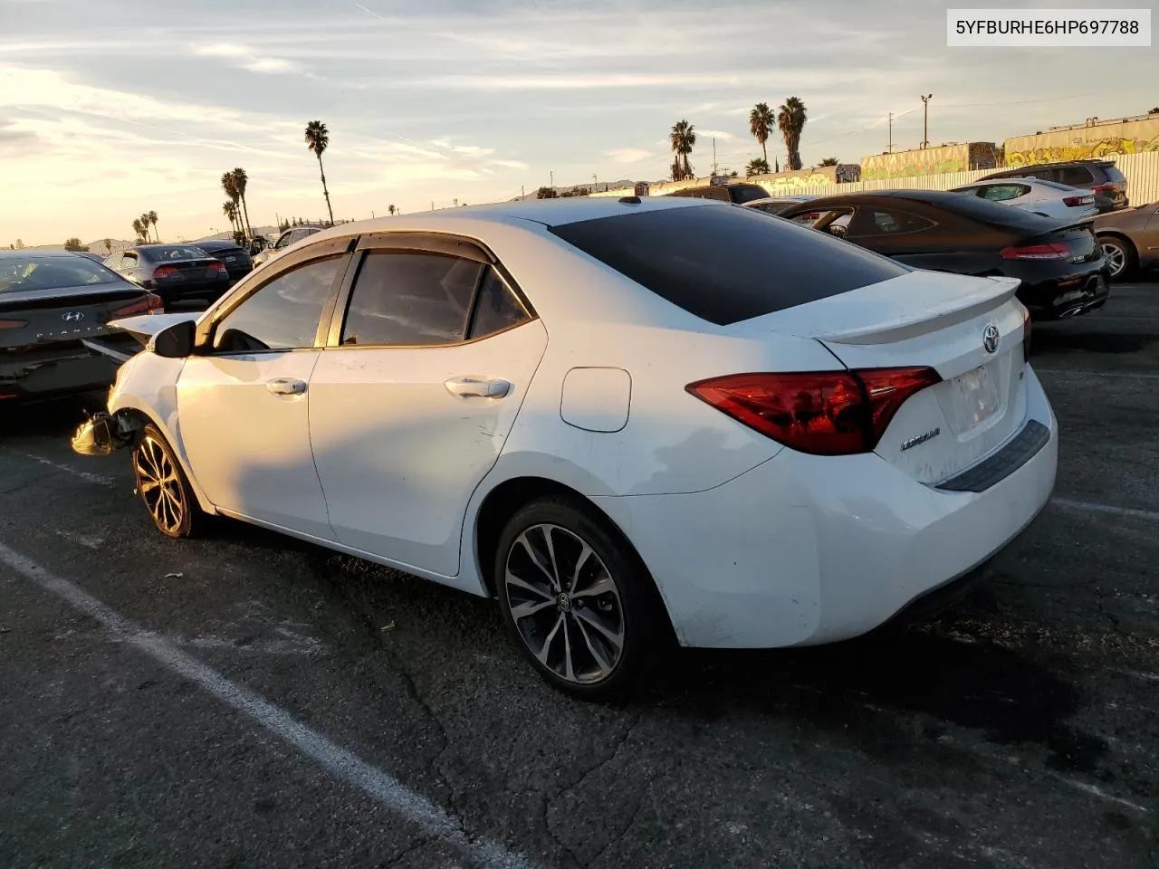 2017 Toyota Corolla L VIN: 5YFBURHE6HP697788 Lot: 79916054