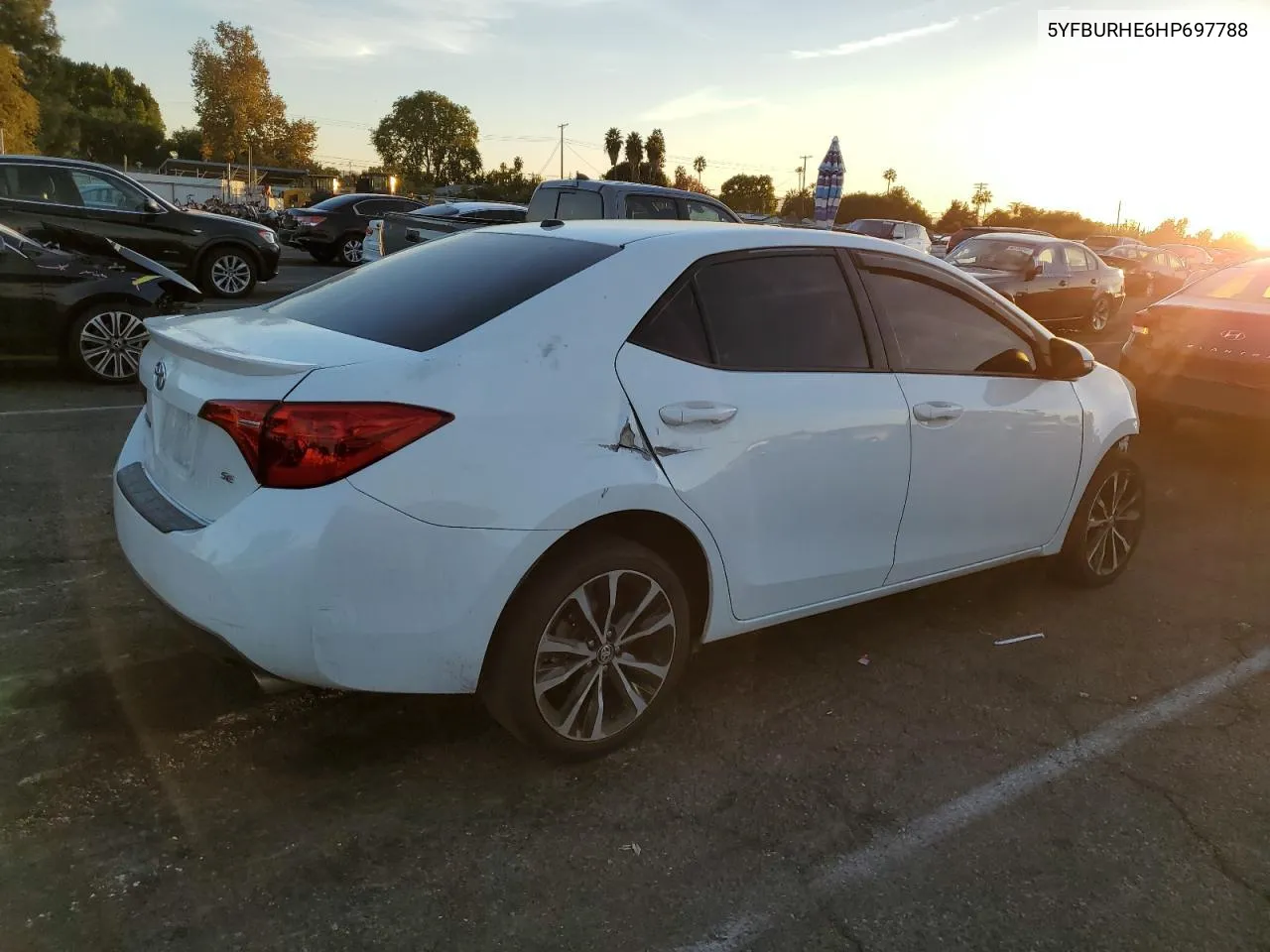 2017 Toyota Corolla L VIN: 5YFBURHE6HP697788 Lot: 79916054