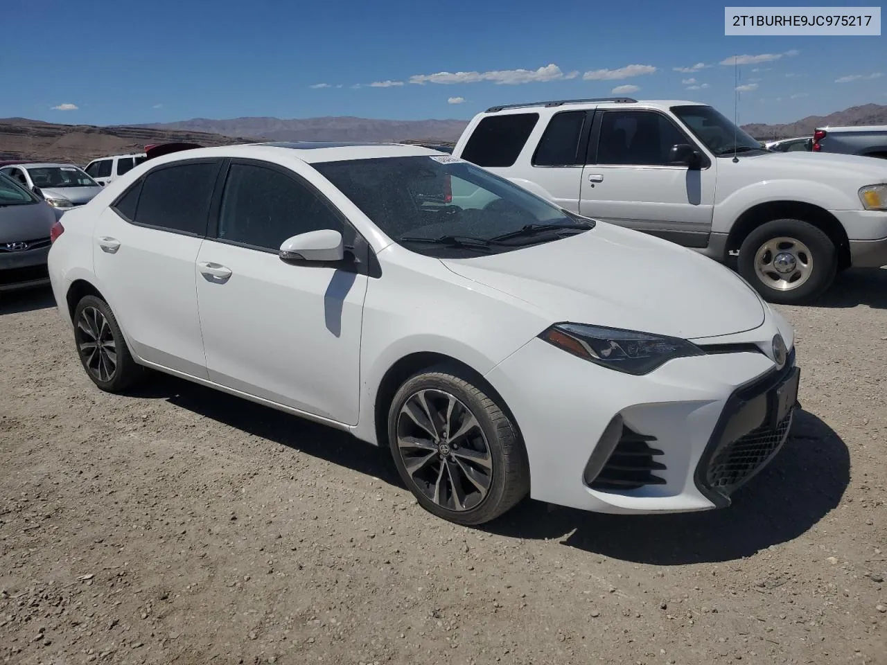 2018 Toyota Corolla L VIN: 2T1BURHE9JC975217 Lot: 64849504