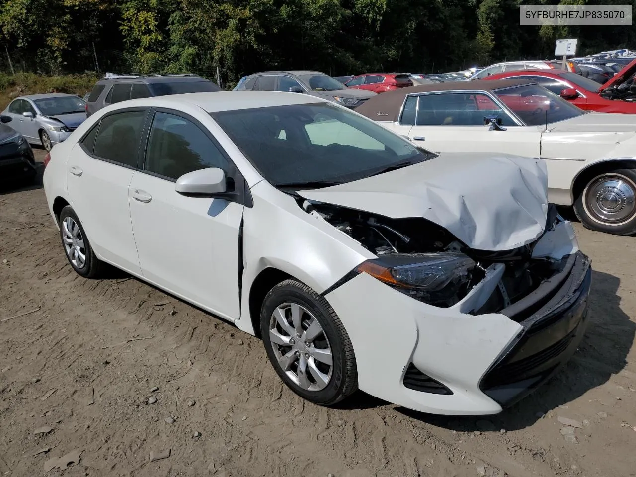 2018 Toyota Corolla L VIN: 5YFBURHE7JP835070 Lot: 69610534