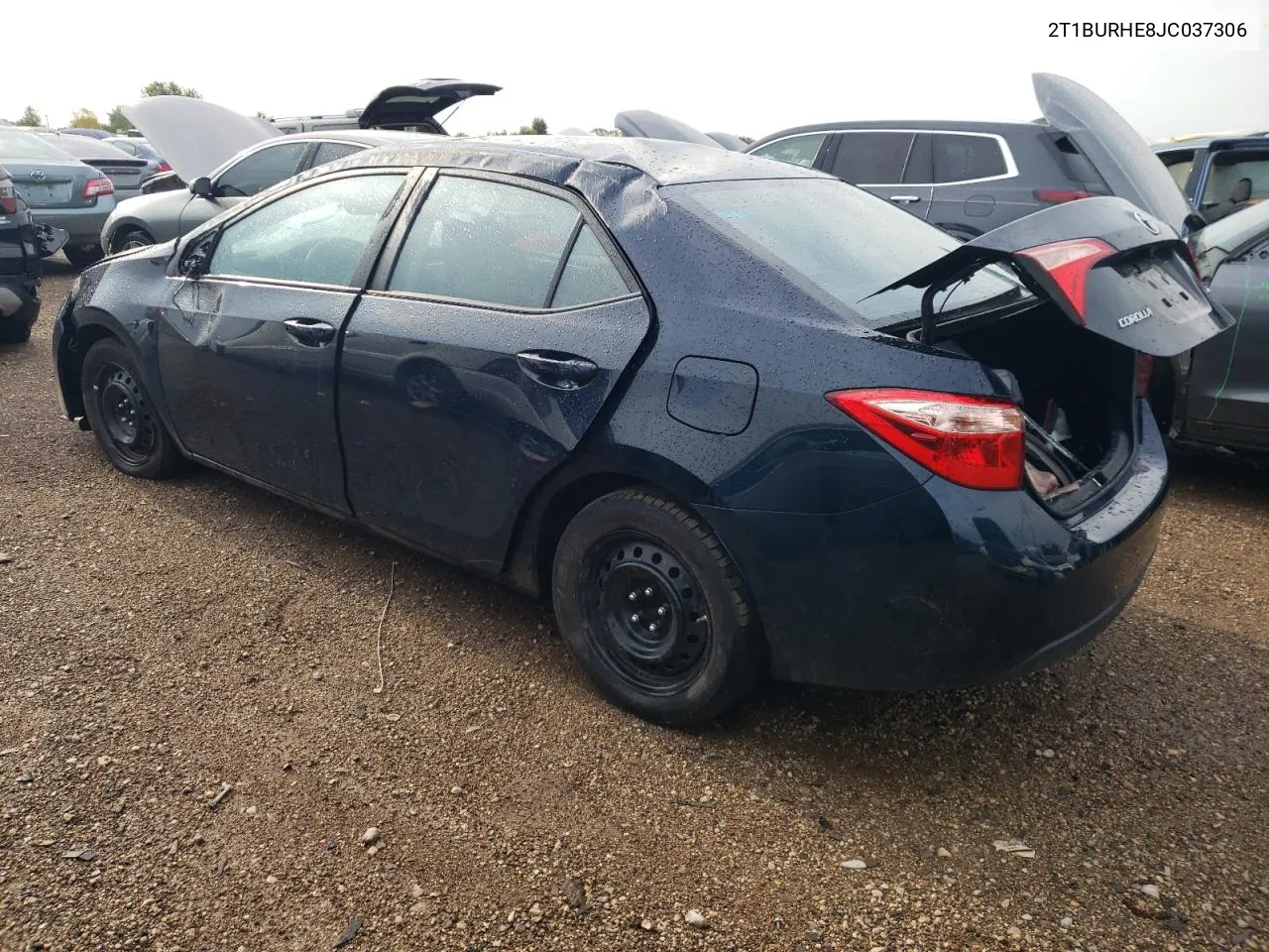 2018 Toyota Corolla L VIN: 2T1BURHE8JC037306 Lot: 69642644