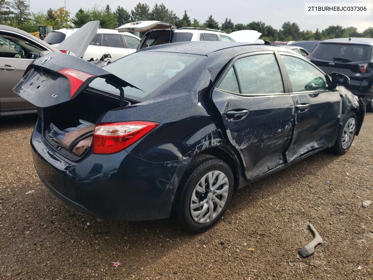 2018 Toyota Corolla L VIN: 2T1BURHE8JC037306 Lot: 69642644