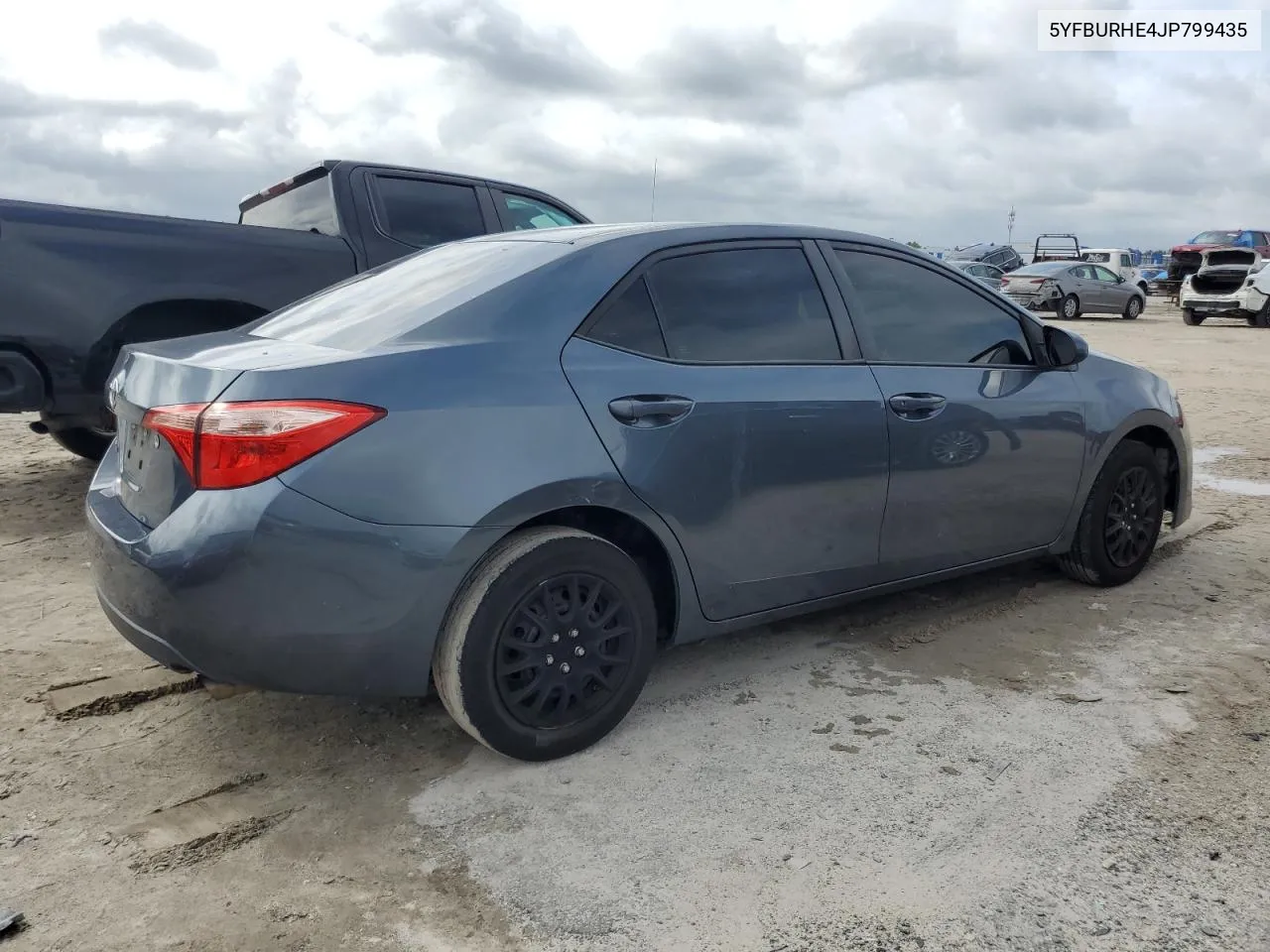 2018 Toyota Corolla L VIN: 5YFBURHE4JP799435 Lot: 70949874