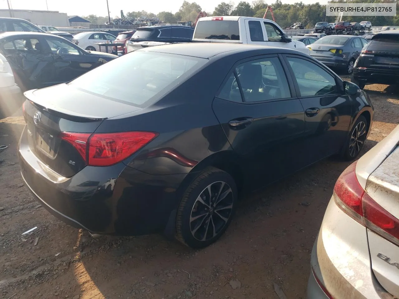 2018 Toyota Corolla L VIN: 5YFBURHE4JP812765 Lot: 71122194