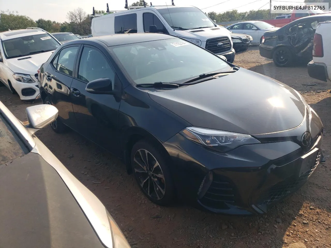 2018 Toyota Corolla L VIN: 5YFBURHE4JP812765 Lot: 71122194