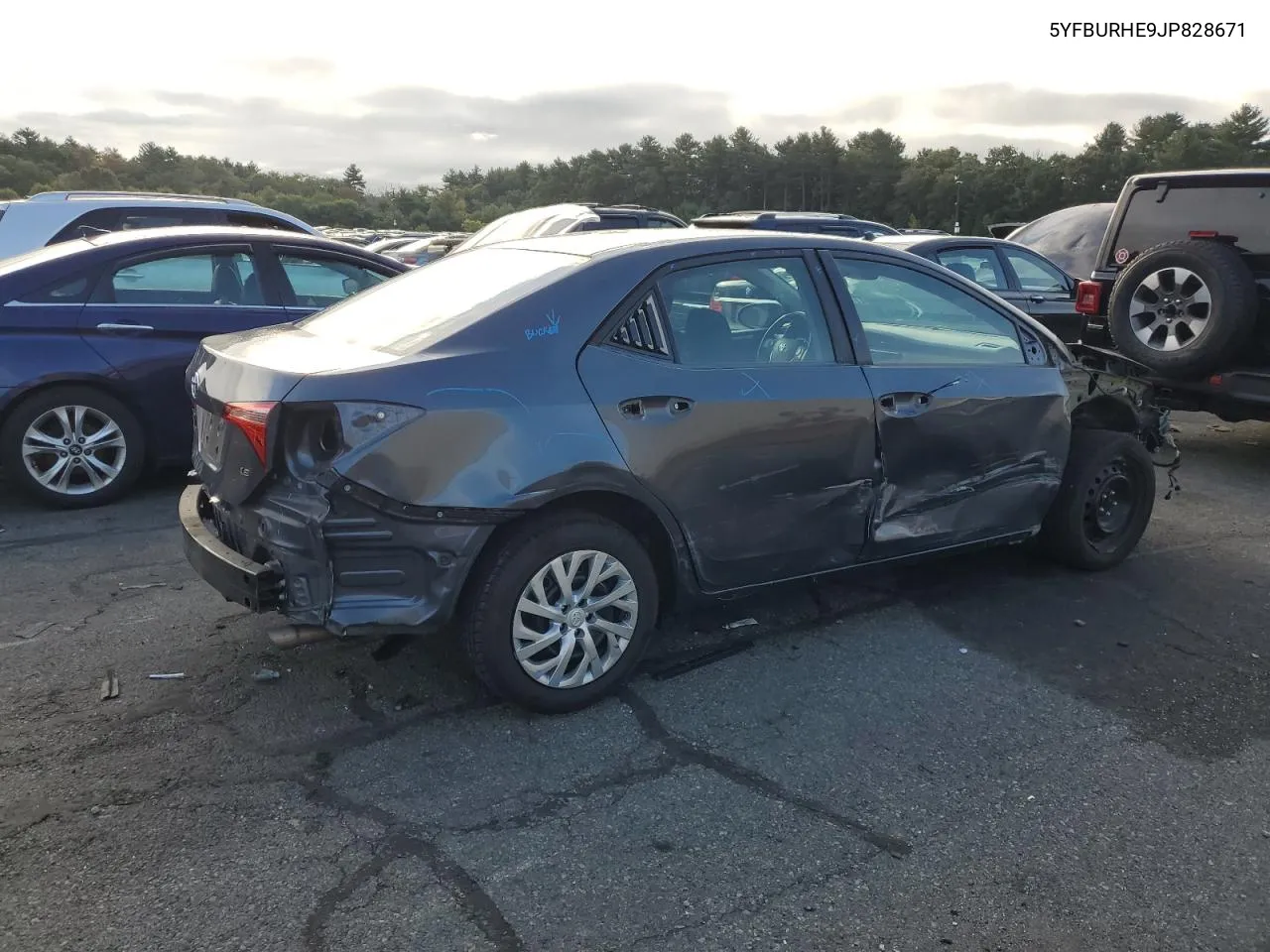 2018 Toyota Corolla L VIN: 5YFBURHE9JP828671 Lot: 71601574