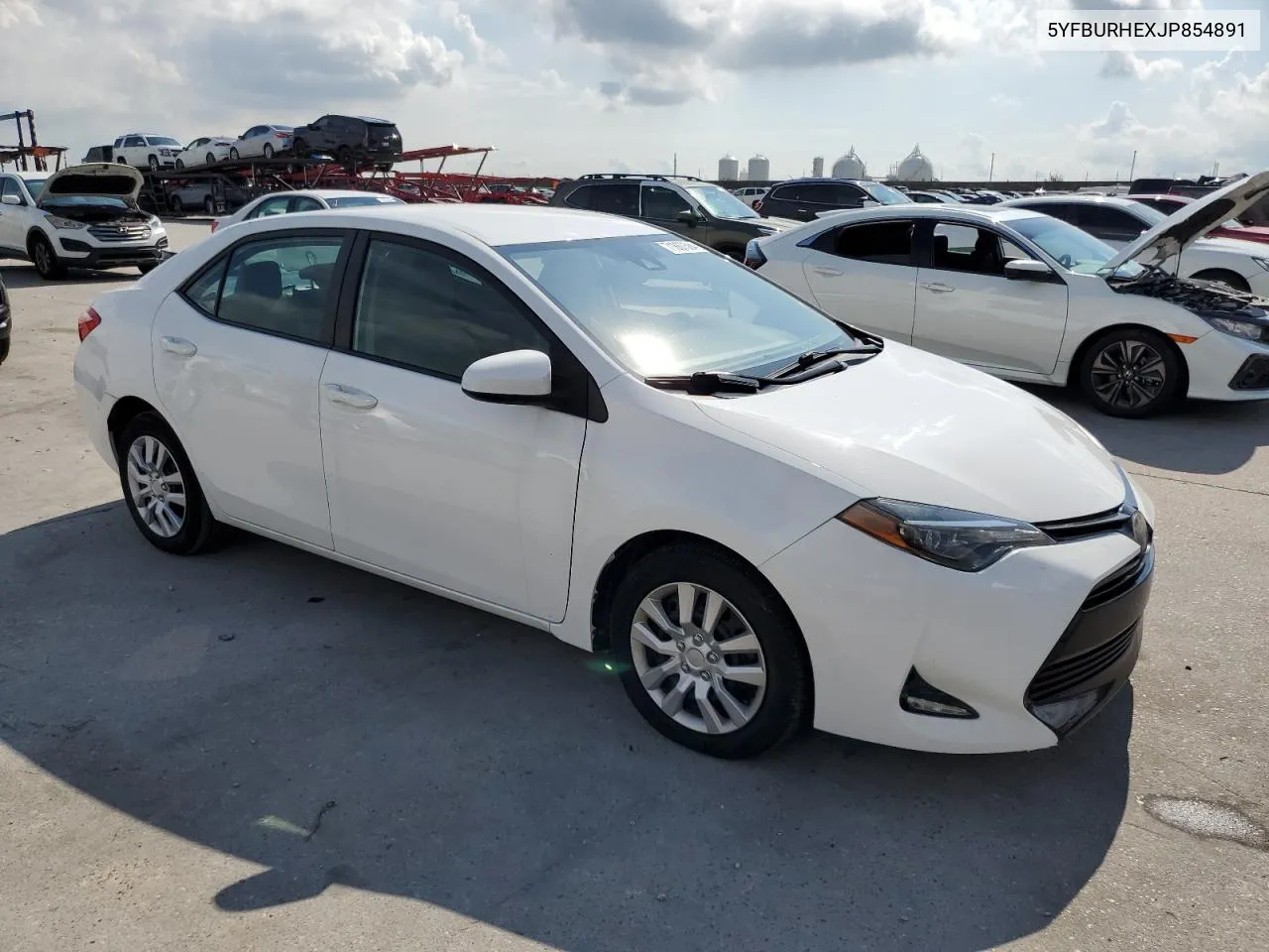 2018 Toyota Corolla L VIN: 5YFBURHEXJP854891 Lot: 71867504