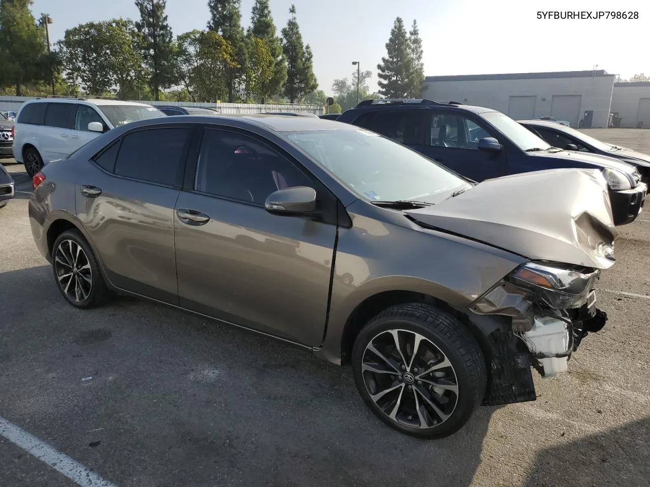 2018 Toyota Corolla L VIN: 5YFBURHEXJP798628 Lot: 72650594