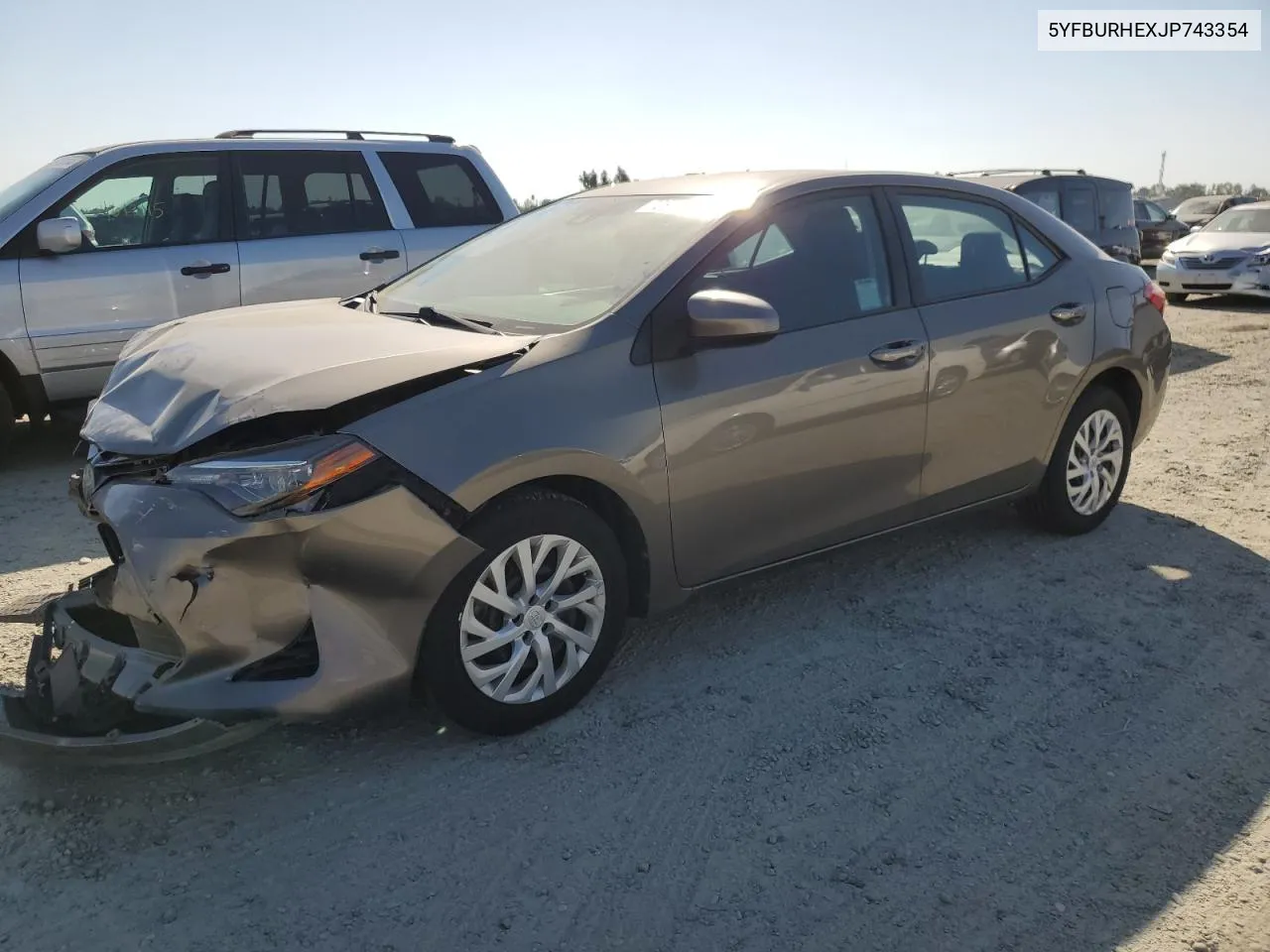 2018 Toyota Corolla L VIN: 5YFBURHEXJP743354 Lot: 72856534