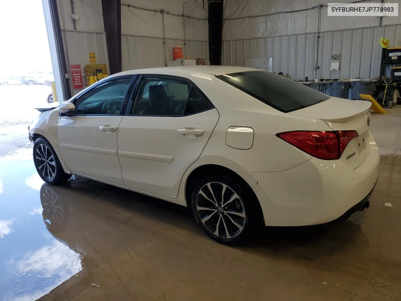 2018 Toyota Corolla L VIN: 5YFBURHE7JP778983 Lot: 73005574