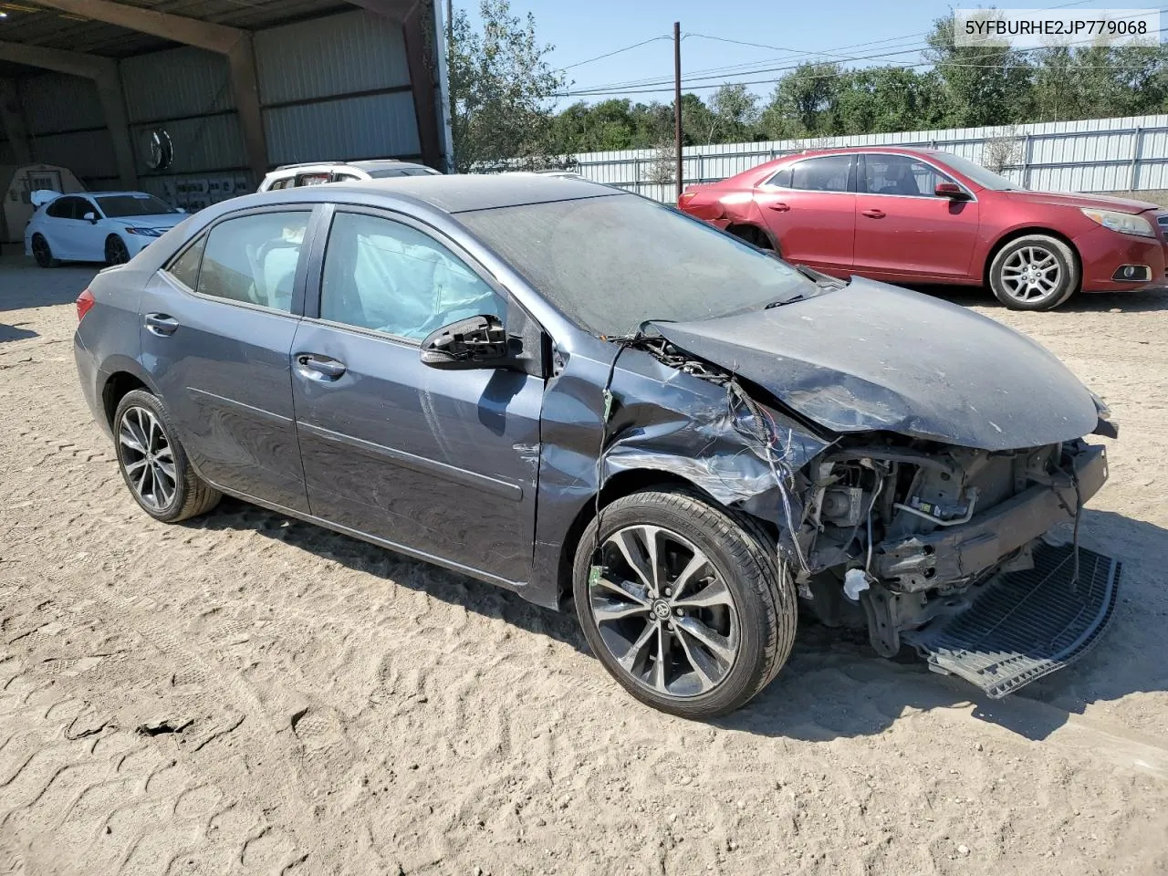 2018 Toyota Corolla L VIN: 5YFBURHE2JP779068 Lot: 74083094