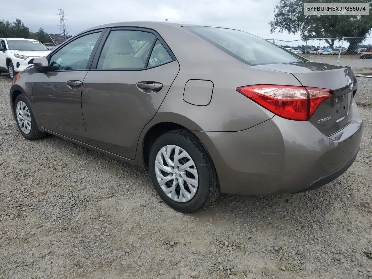 2018 Toyota Corolla L VIN: 5YFBURHEXJP856074 Lot: 74957554