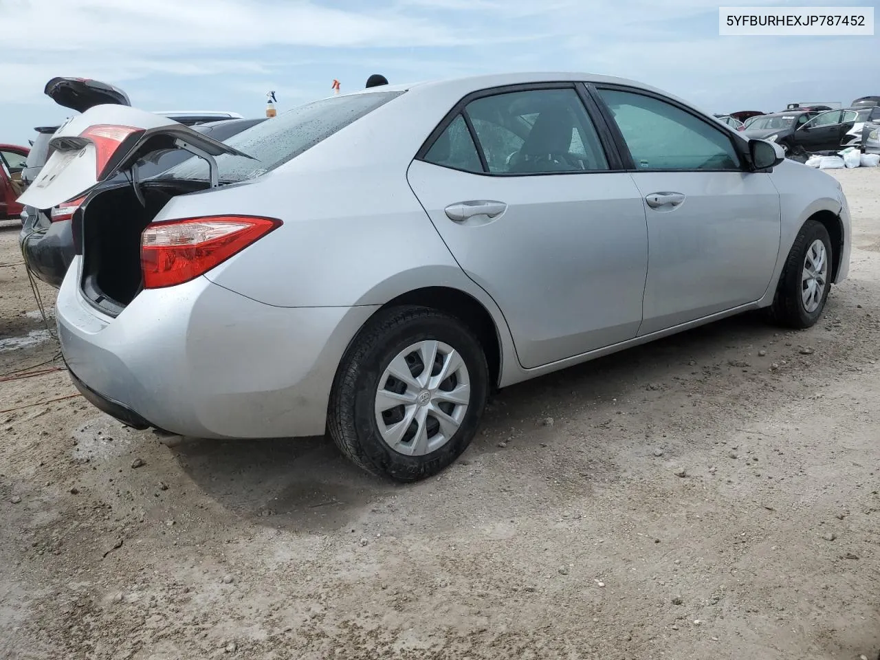 2018 Toyota Corolla L VIN: 5YFBURHEXJP787452 Lot: 75084644