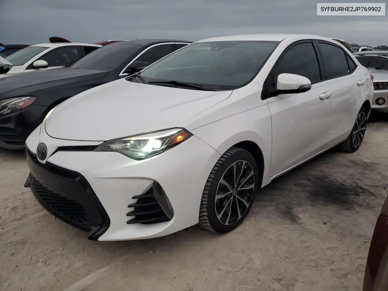 2018 Toyota Corolla L VIN: 5YFBURHE2JP769902 Lot: 76821004