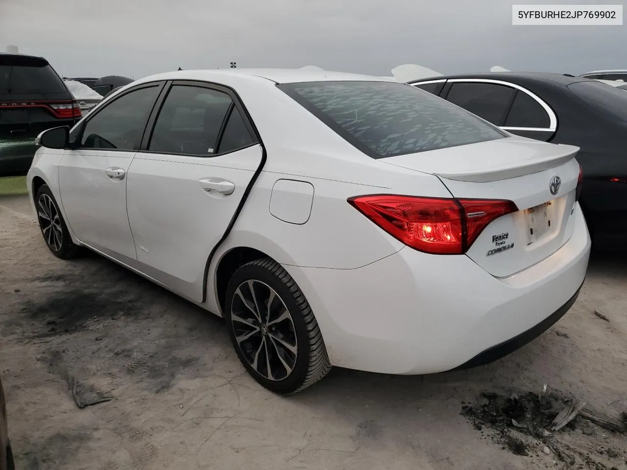 2018 Toyota Corolla L VIN: 5YFBURHE2JP769902 Lot: 76821004