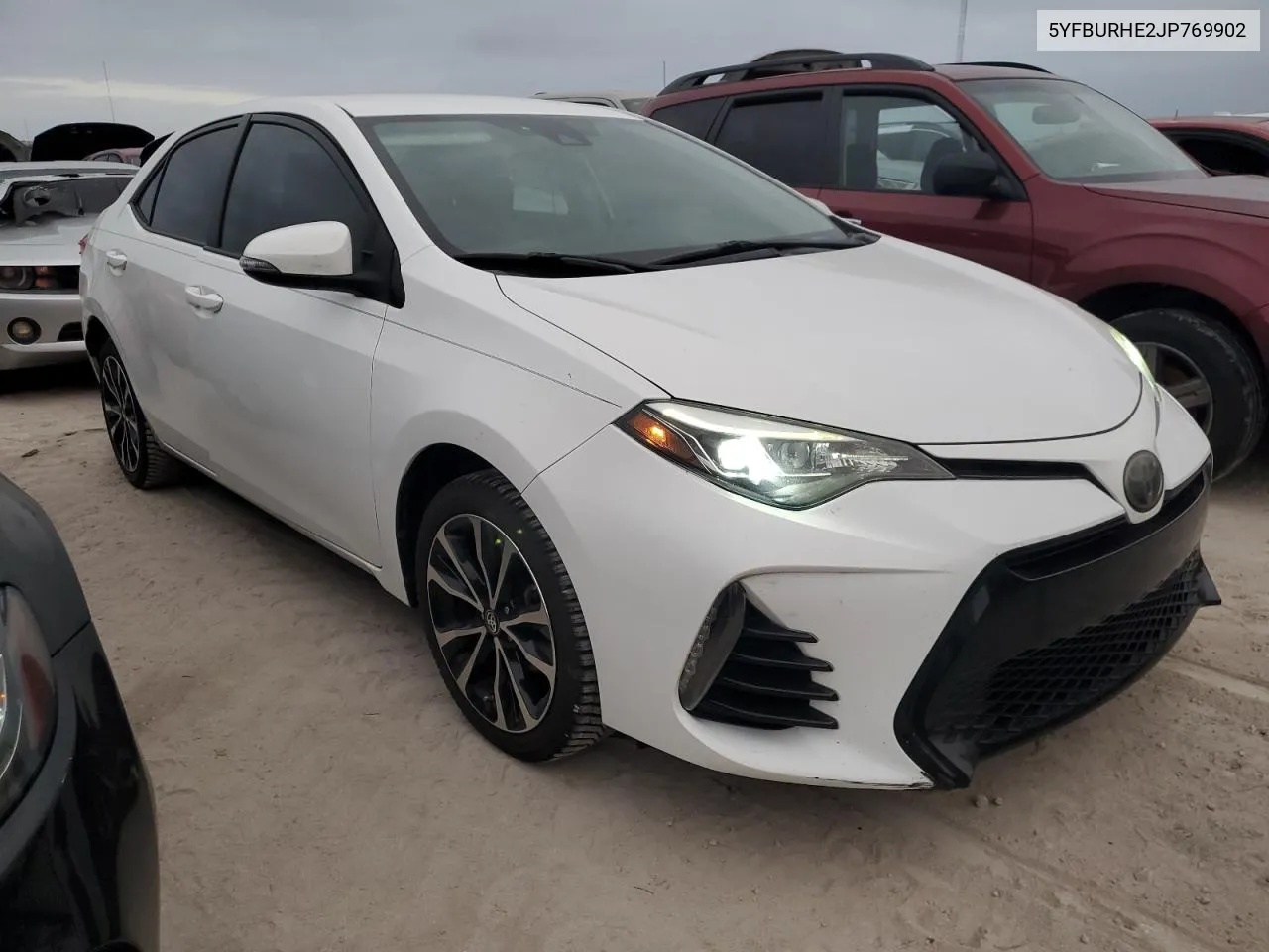 2018 Toyota Corolla L VIN: 5YFBURHE2JP769902 Lot: 76821004