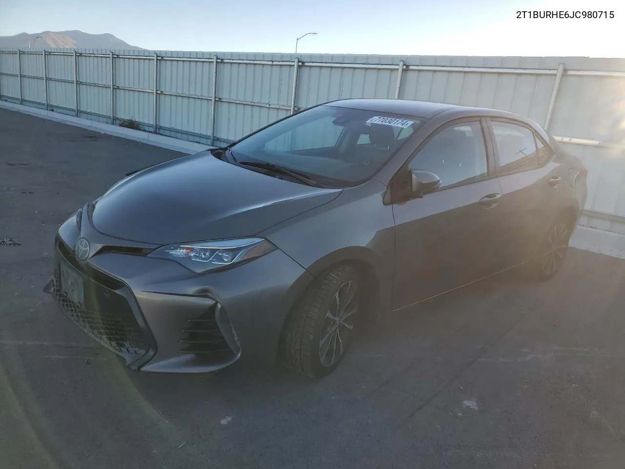 2018 Toyota Corolla L VIN: 2T1BURHE6JC980715 Lot: 77030174