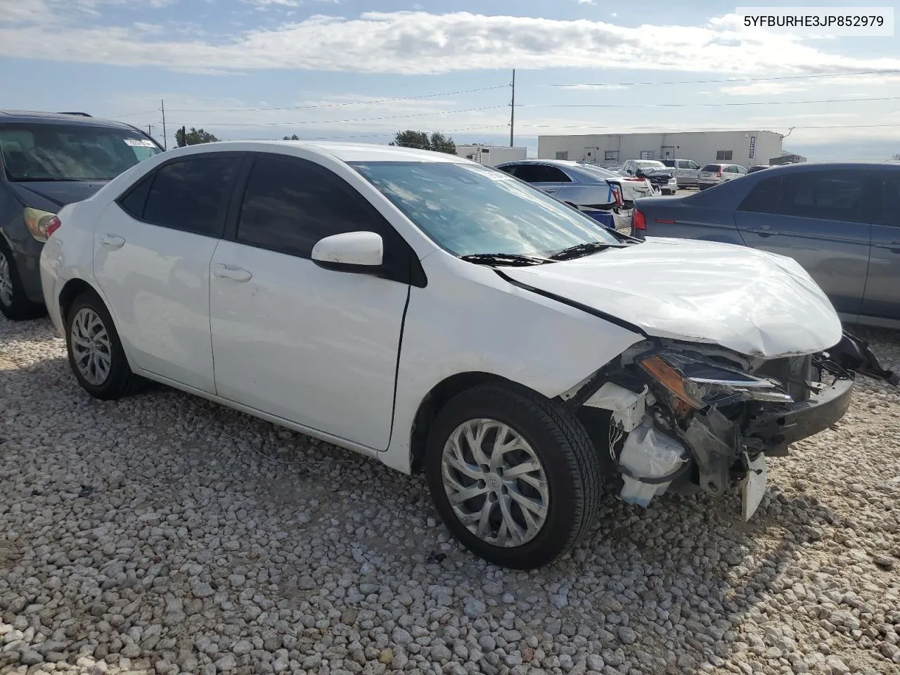 2018 Toyota Corolla L VIN: 5YFBURHE3JP852979 Lot: 79136414