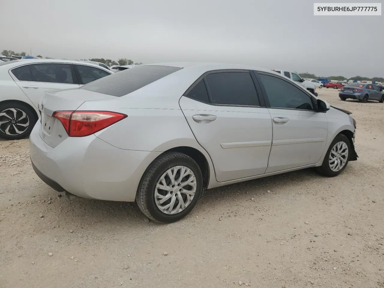 2018 Toyota Corolla L VIN: 5YFBURHE6JP777775 Lot: 79865964