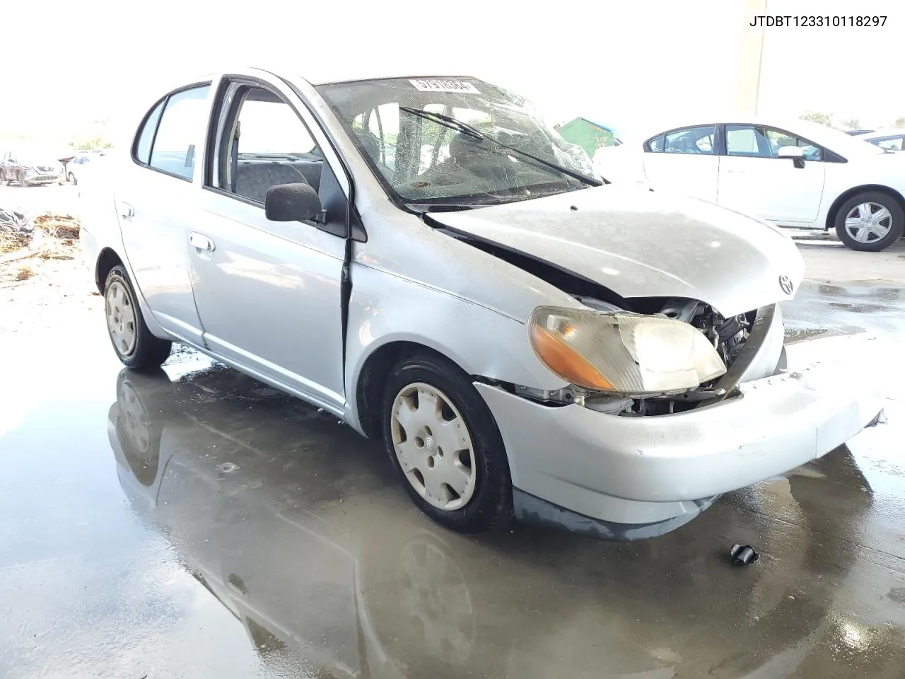 2001 Toyota Echo VIN: JTDBT123310118297 Lot: 57918364