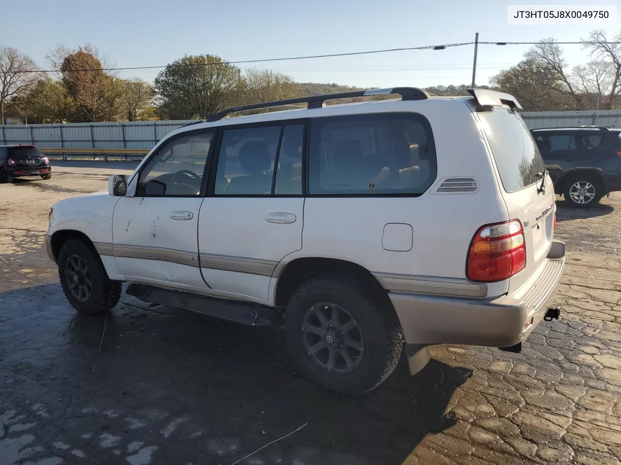 1999 Toyota Land Cruiser VIN: JT3HT05J8X0049750 Lot: 77547144