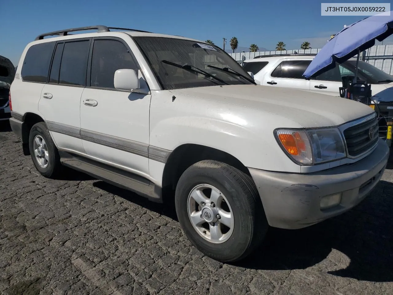 1999 Toyota Land Cruiser VIN: JT3HT05J0X0059222 Lot: 77713294