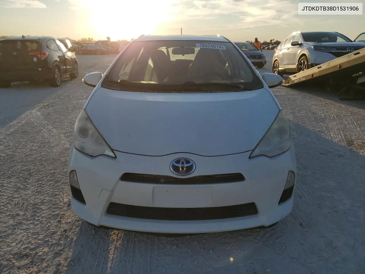 2013 Toyota Prius C VIN: JTDKDTB38D1531906 Lot: 76024014