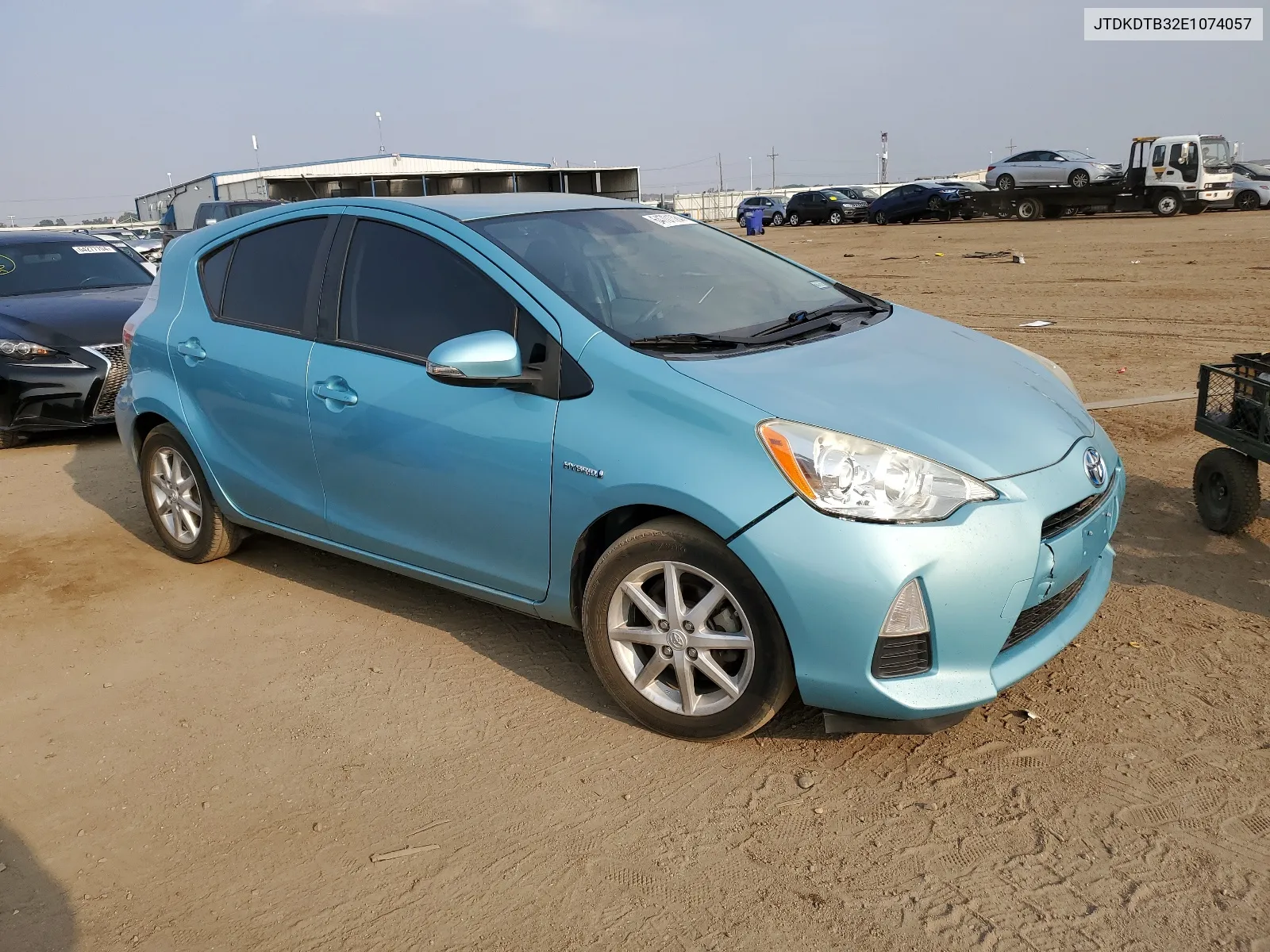 2014 Toyota Prius C VIN: JTDKDTB32E1074057 Lot: 64701084