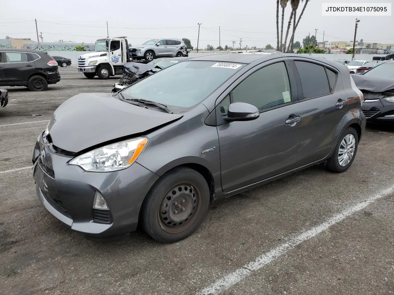 2014 Toyota Prius C VIN: JTDKDTB34E1075095 Lot: 76690874