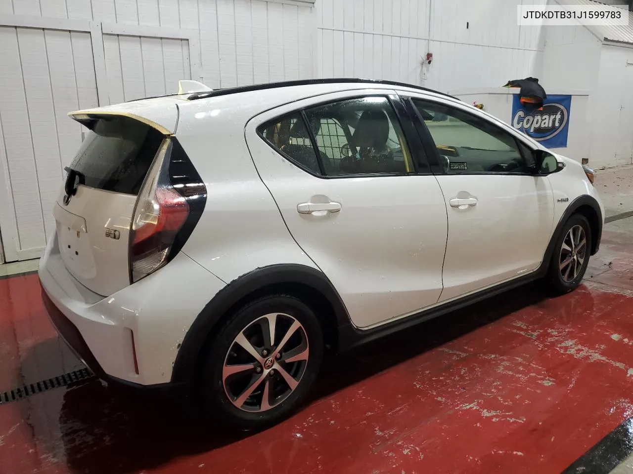 2018 Toyota Prius C VIN: JTDKDTB31J1599783 Lot: 79891884