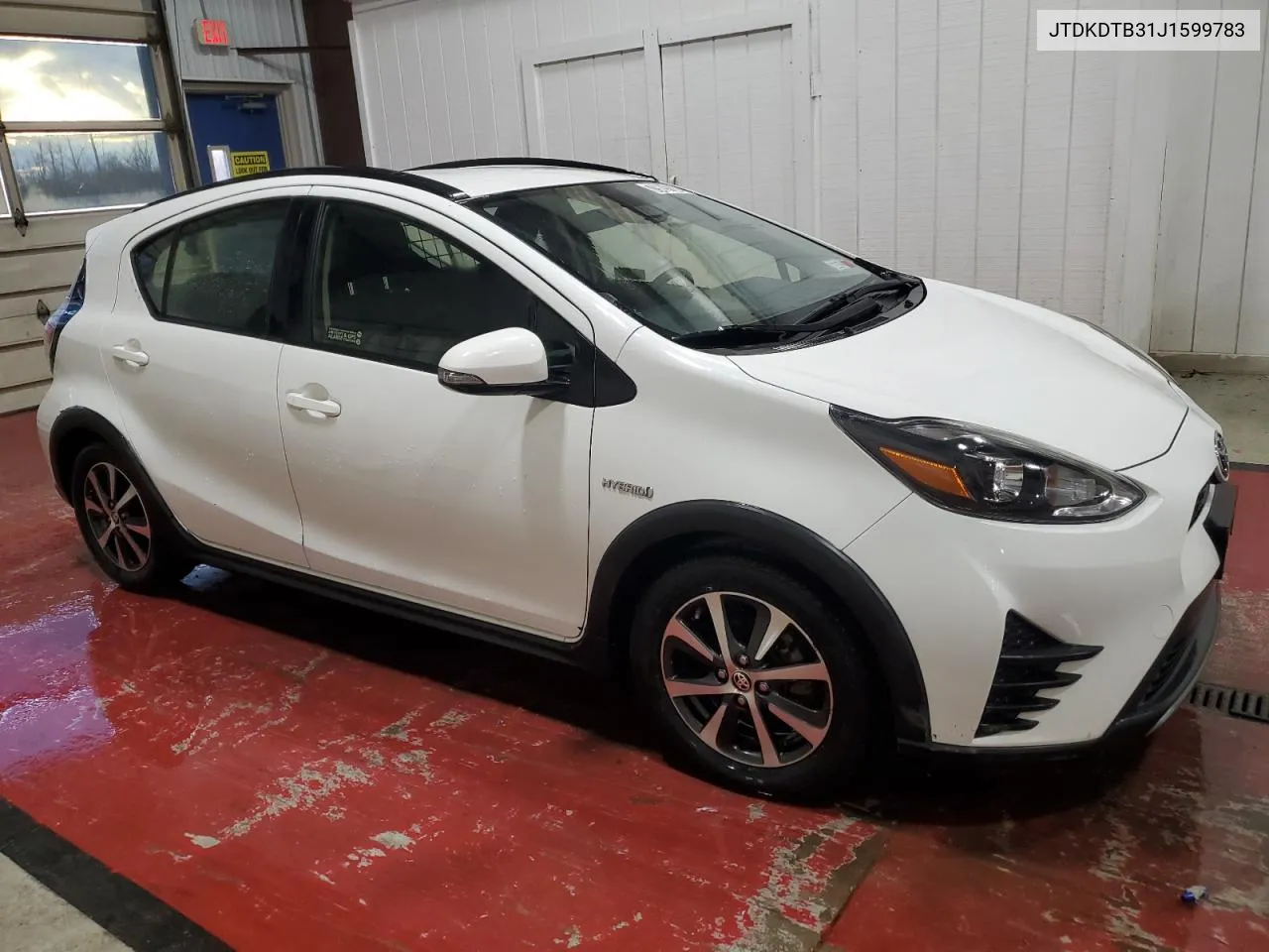 2018 Toyota Prius C VIN: JTDKDTB31J1599783 Lot: 79891884