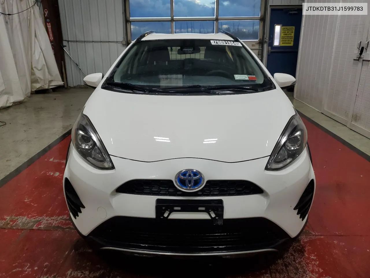 2018 Toyota Prius C VIN: JTDKDTB31J1599783 Lot: 79891884