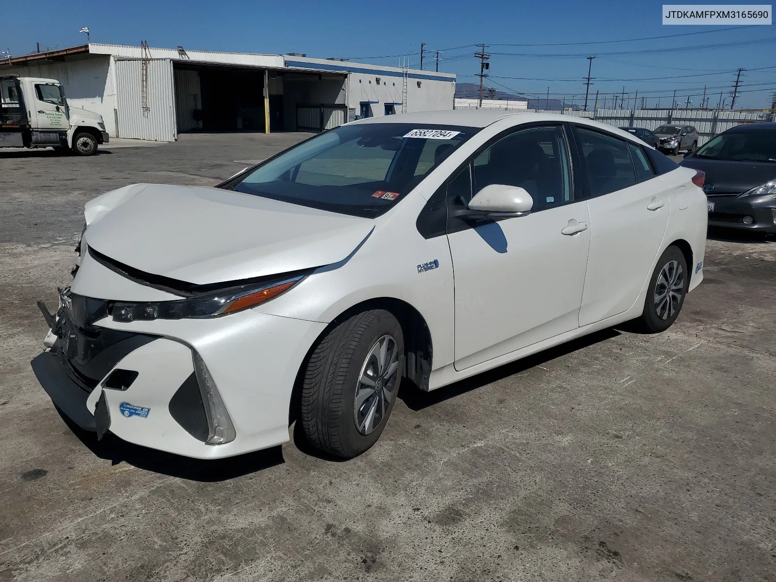 2021 Toyota Prius Prime Le VIN: JTDKAMFPXM3165690 Lot: 65827094