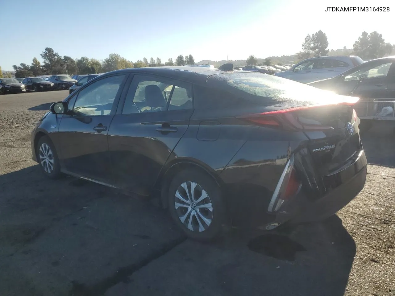 2021 Toyota Prius Prime Le VIN: JTDKAMFP1M3164928 Lot: 74759304