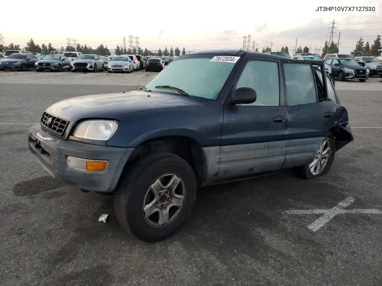 1999 Toyota Rav4 VIN: JT3HP10V7X7127530 Lot: 75672034