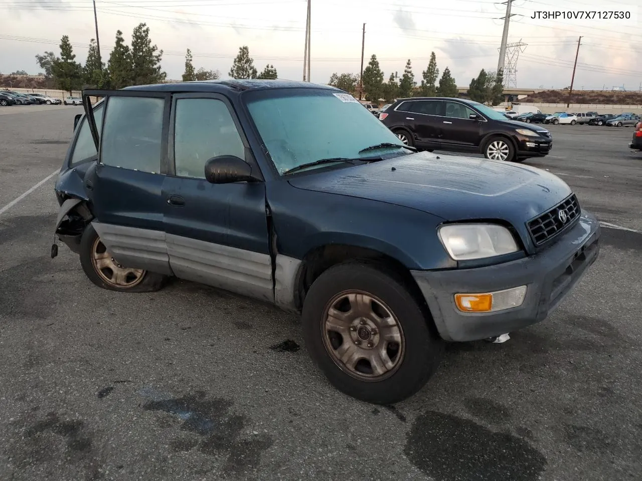 1999 Toyota Rav4 VIN: JT3HP10V7X7127530 Lot: 75672034