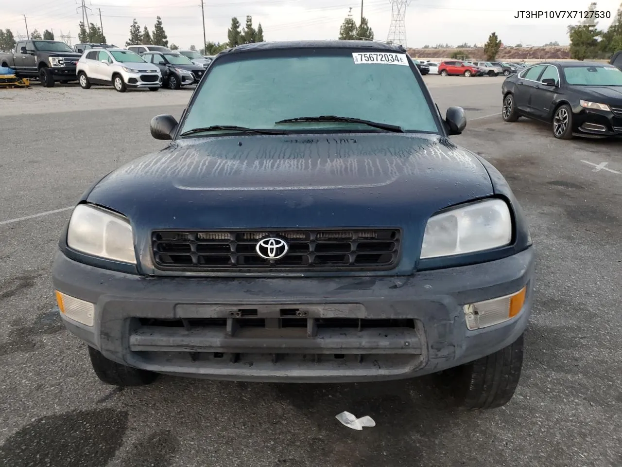 1999 Toyota Rav4 VIN: JT3HP10V7X7127530 Lot: 75672034