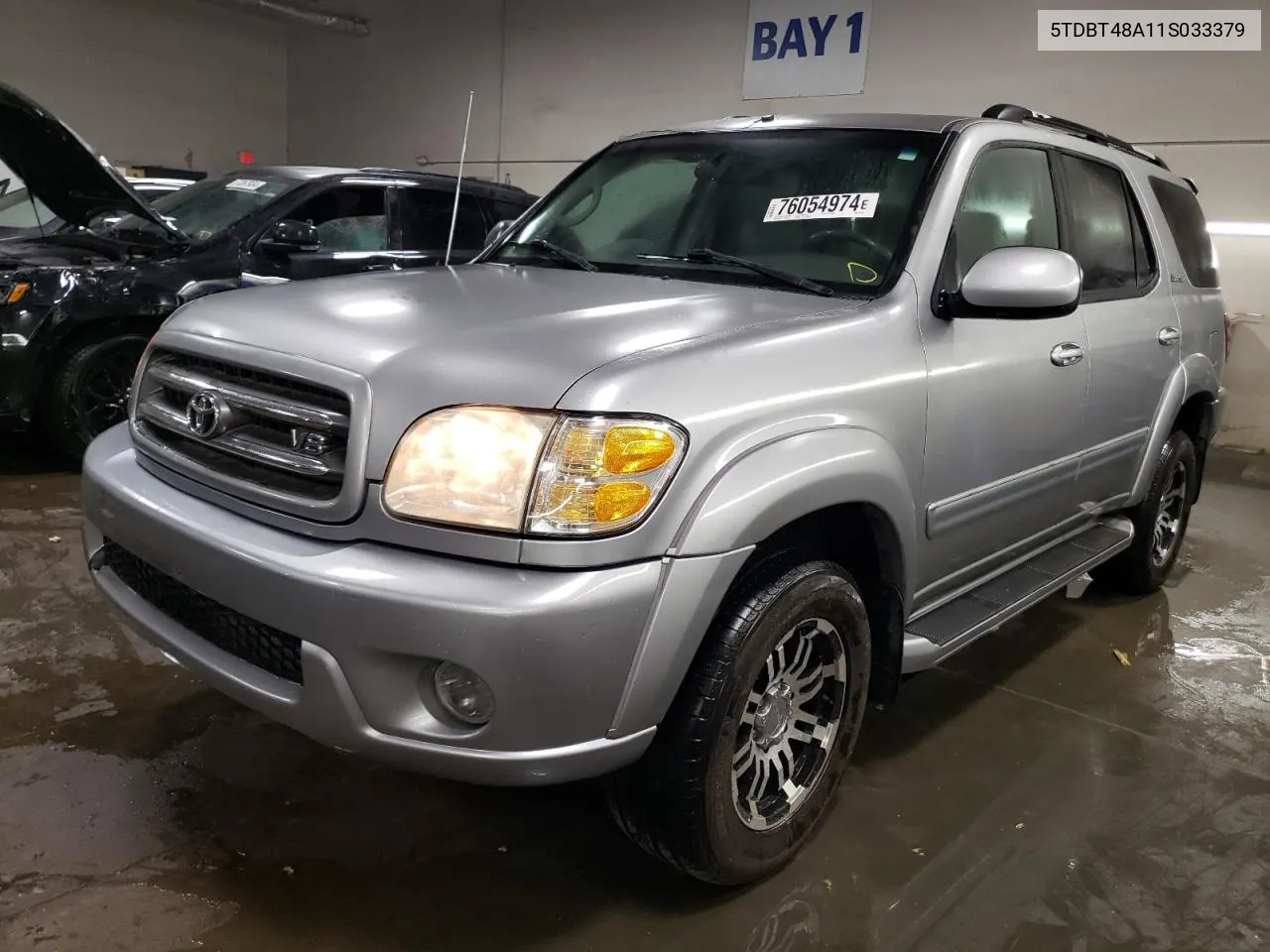 2001 Toyota Sequoia Limited VIN: 5TDBT48A11S033379 Lot: 76054974