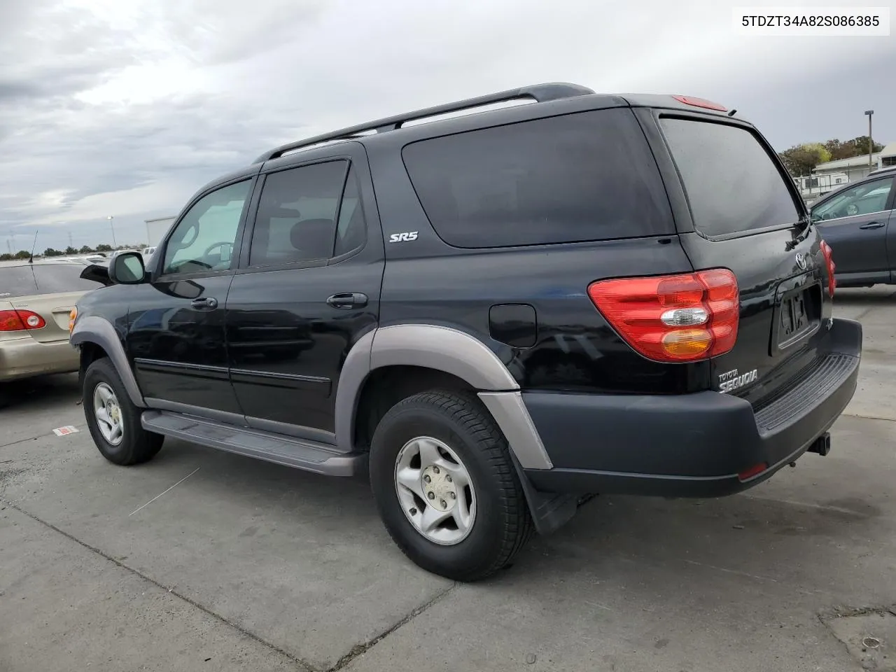 2002 Toyota Sequoia Sr5 VIN: 5TDZT34A82S086385 Lot: 76409704