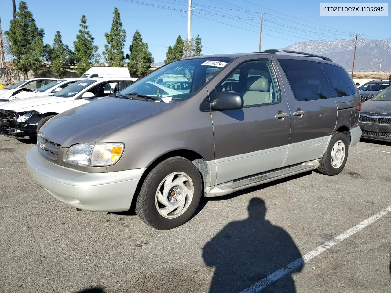 1999 Toyota Sienna Le VIN: 4T3ZF13C7XU135595 Lot: 80868354