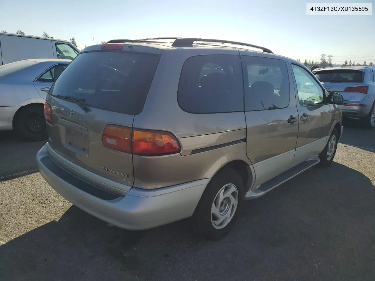 1999 Toyota Sienna Le VIN: 4T3ZF13C7XU135595 Lot: 80868354