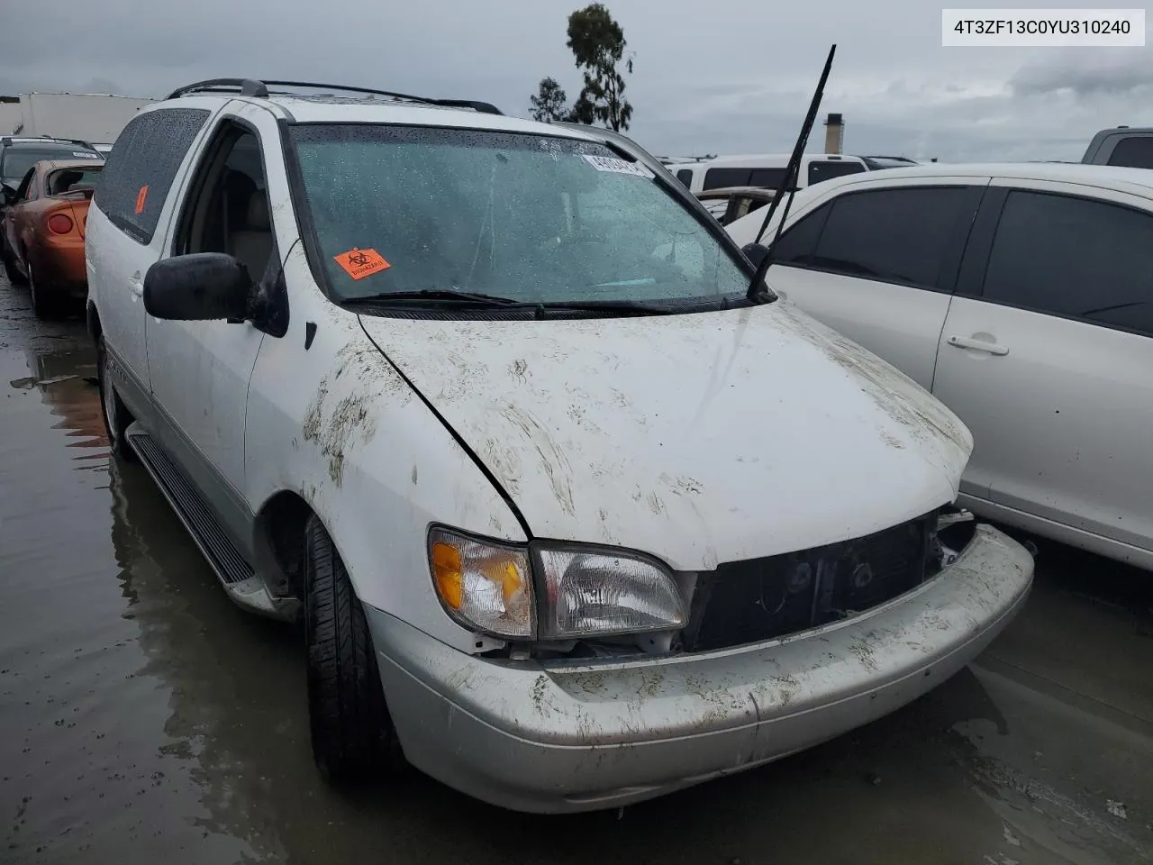 2000 Toyota Sienna Le VIN: 4T3ZF13C0YU310240 Lot: 49094214