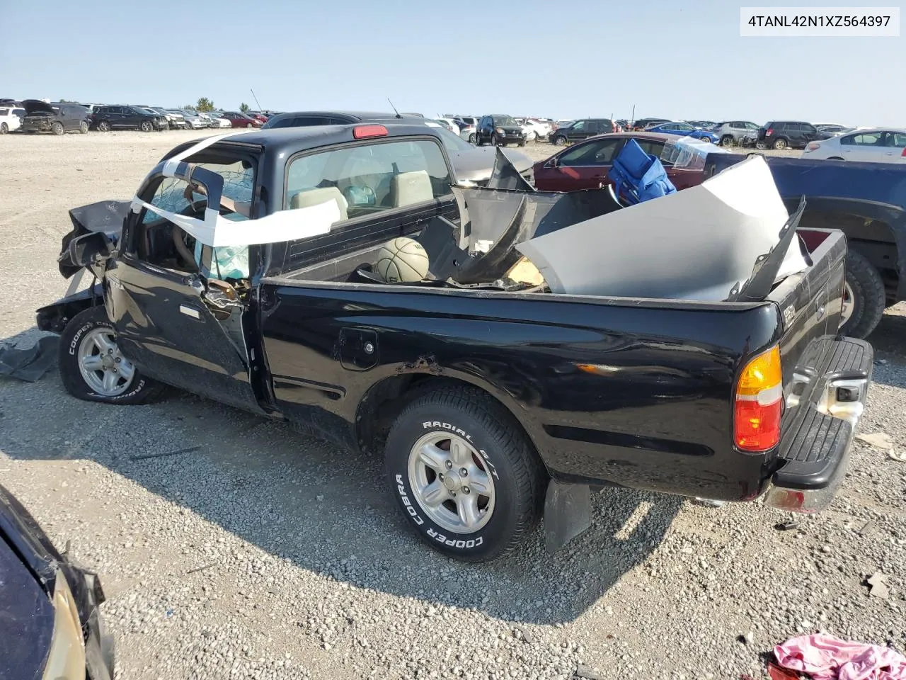 1999 Toyota Tacoma VIN: 4TANL42N1XZ564397 Lot: 70490394