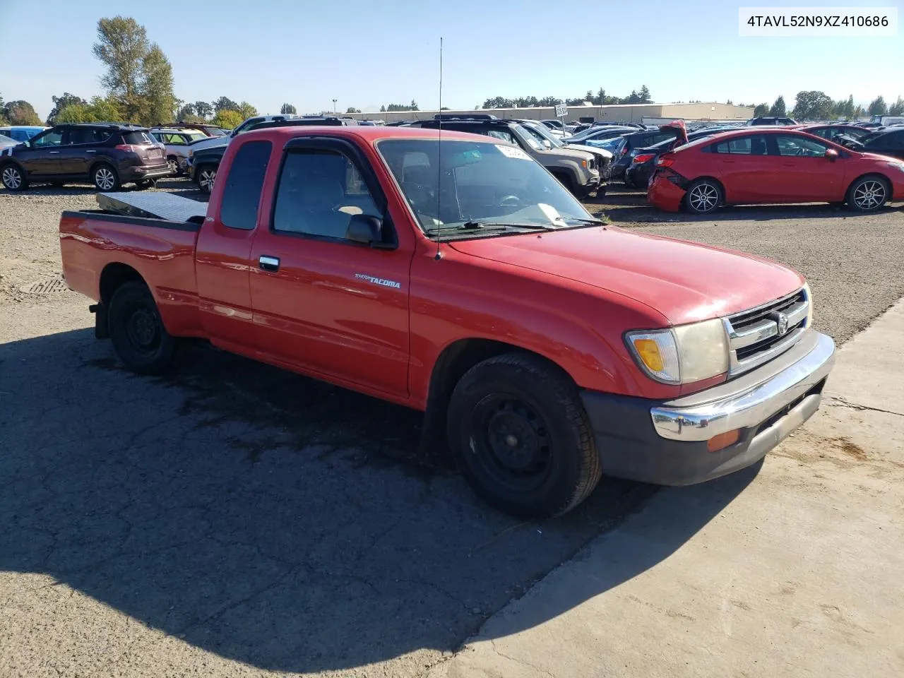 1999 Toyota Tacoma Xtracab VIN: 4TAVL52N9XZ410686 Lot: 73609494