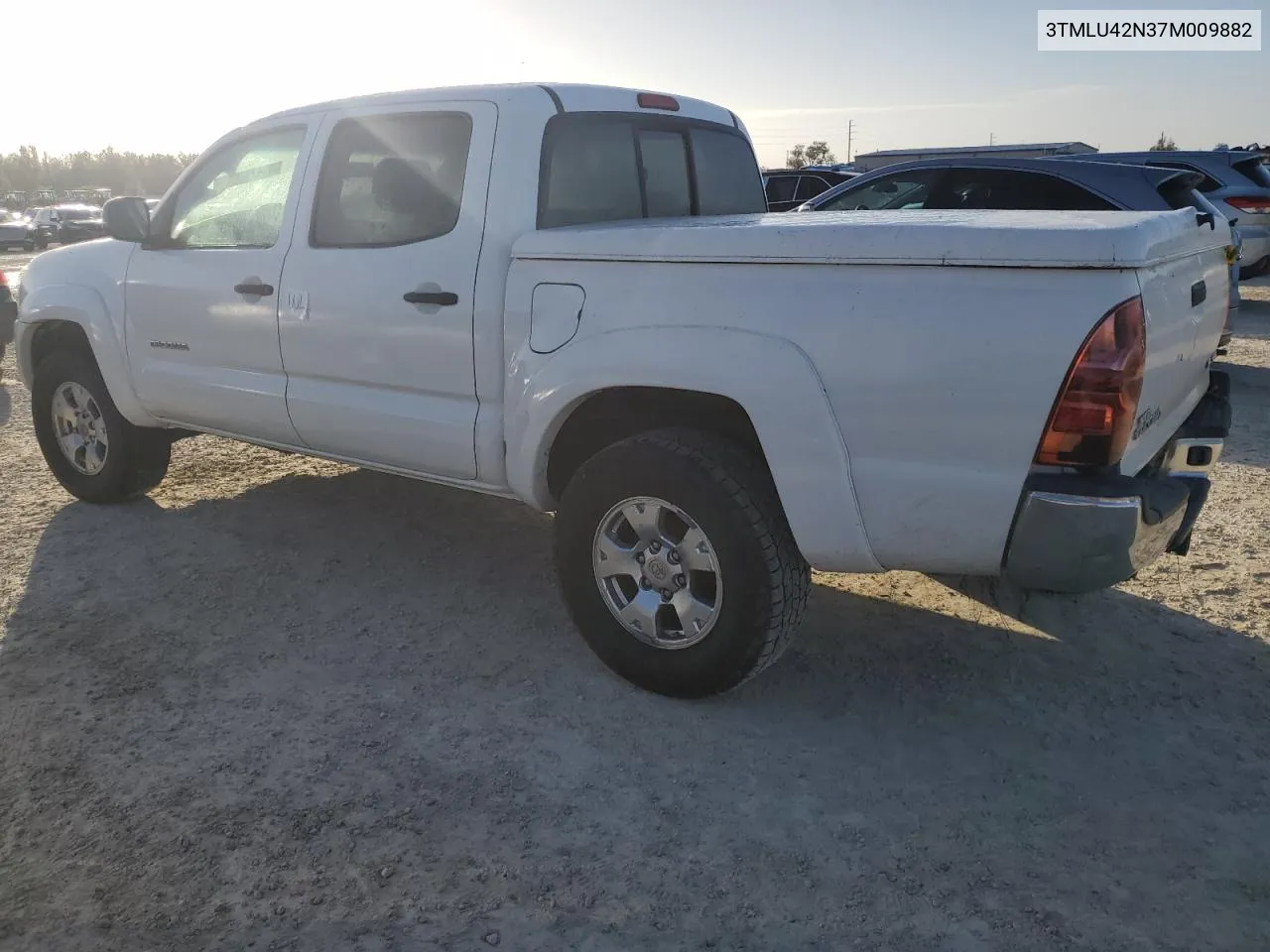 2007 Toyota Tacoma Double Cab VIN: 3TMLU42N37M009882 Lot: 79066864